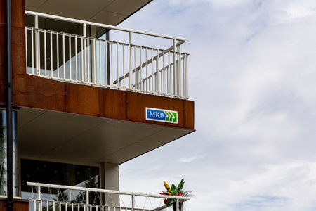 MalmÃ¶, Sweden - July 20 2019: A real estate company MKB sign mounted on a balcony on a new building that is called Sweden's ugliest building by architects.のeditorial素材