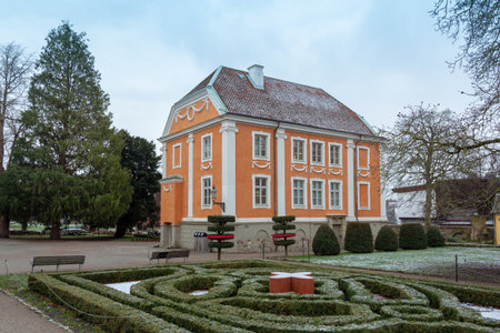 Lund, Sweden - December 16, 2018: An orange, traditional villa in a public park in Lund, Swedenのeditorial素材