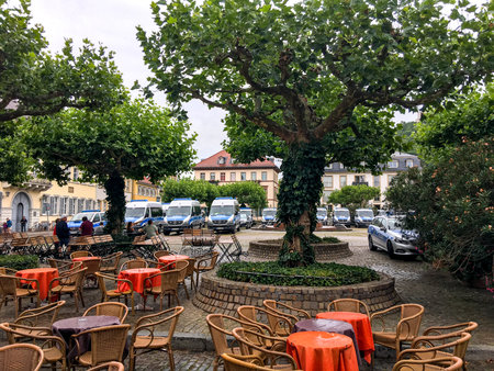 Heidelberg, Germany - July 20, 2017: A town square is filled with German police cars as Prince William and Kate visits the town on a rainy summer day.のeditorial素材