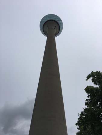 DÃ¼sseldorf, Germany - July 25, 2017: German architecture and Rheinturm seen from below on an overcast summer dayのeditorial素材