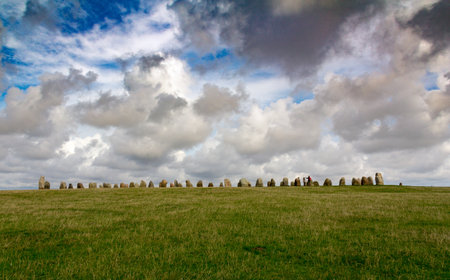 KÃ¥seberga, Sweden - September 10, 2017: The megalithic stone ship monument stands in a high green hill in the southern parts of Scania and still wonders peopleのeditorial素材