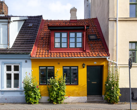 MalmÃ¶, Sweden - July 10, 2018: A small yellow street house in the old parts of the city is a tourist attractionのeditorial素材