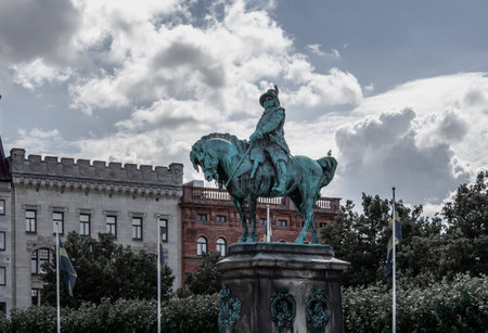 MalmÃ¶, Sweden - July 11, 2018: A statue of a man on a horse on one of the big squares called Stortorget in MalmÃ¶, Sweden on a summer dayのeditorial素材