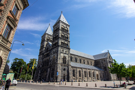 Lund, Sweden - July 13, 2018: Low wide angle of Lund Cathedral on a warm summer day in Lund, Swedenのeditorial素材