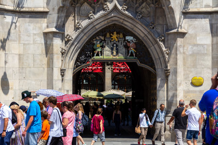Munich, Germany - July 19, 2018: Lots of people and tourists are going in and out of the city hall (Neues Rathaus) at Marienplatz in the old townのeditorial素材