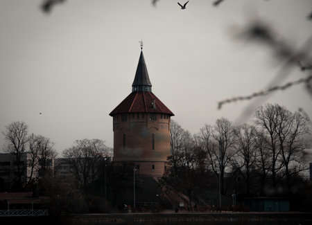 MalmÃ¶, Sweden - April 7, 2019: The old water tower still stands on a small hill in the park...