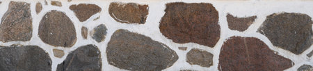 A close up of a stone wall textureの写真素材