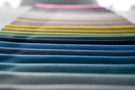 Gradient colored luxury velvet samples folded in rows