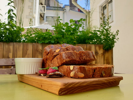 Some slices of bread on wooden plate before dinnerの写真素材