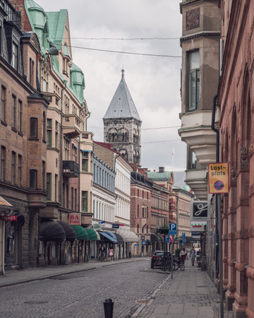 Lund, Sweden - August 2 2020: The street Klostergatan with the Lund cathedral steeple visible in the backgroundのeditorial素材