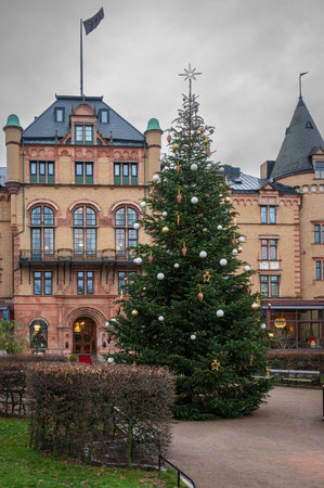 Big decorated Christmas tree at Bantorget in Lund Sweden during winterの写真素材