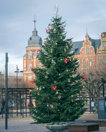 Christmas tree on town square on bright winter morning in Lund Swedenの写真素材