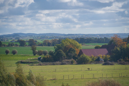 Flat farmlands and pastures in autumn colored SkÃ¥ne (Scania) Swedenの写真素材