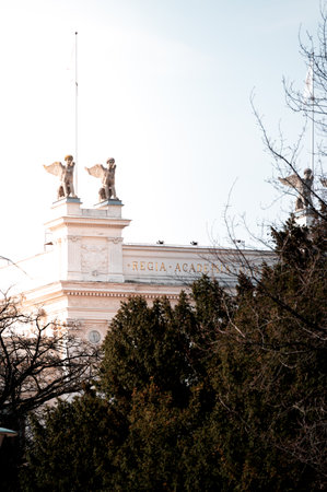 Two sphinxes on the roof of the historic university building in the city center of Lund Sweden