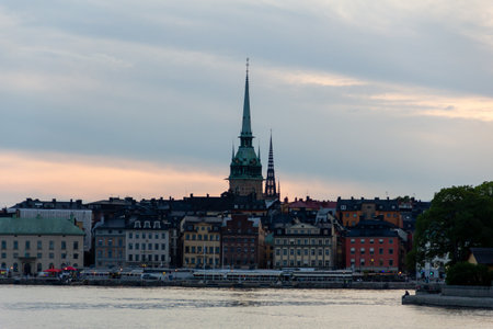 Stockholm old town with church spires during summer sunsetの写真素材