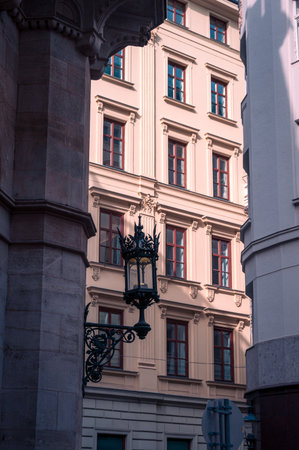Historic facade and ornate lamp in downtown Vienna Austria in summerの写真素材