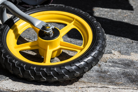 bicycle wheel on pavement