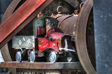 Abandoned tin toy truck found in a train junkyardの写真素材