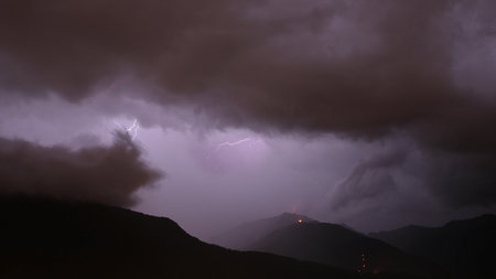 Heavy thunderstorm and lightning strikes over Monte Ceneri pass and Monte Tamaro, Ticino,...