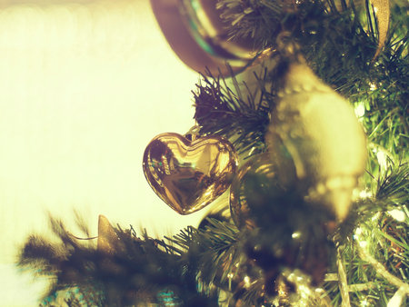 Decorated Christmas tree on  blurred, sparkling and fairy background.の写真素材