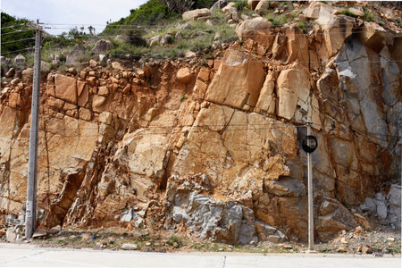 rocks on the beach with blue sky and mountain, The rocky coast.の写真素材