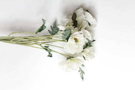 four plastic flower put on white background.の写真素材