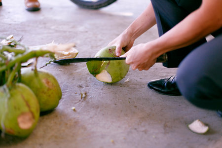 Topical coconuts. with hand chopping and eating .の写真素材