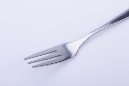 Silver fork on white background. white back groundの写真素材