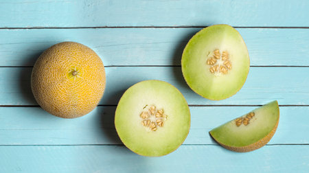 melons on blue wood seen from aboveの写真素材
