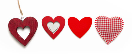 Hearts for Valentine's day, made of different materials handmade with love, white background