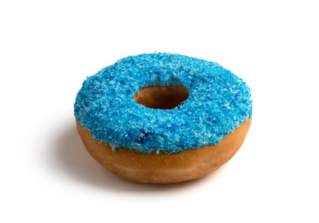 Donut decorated with blue cape. Isolated on white backgroundの写真素材