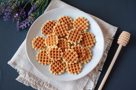 Plate of freshly baked waffles top view