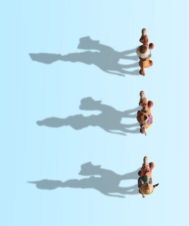 Three Wise Men on camel high view, shadows drawing the Three Wise Men on a blue backgroundの写真素材