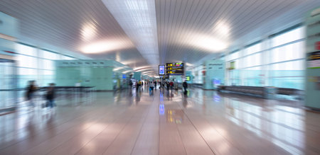 Interior of an airport terminal with motion blurの写真素材