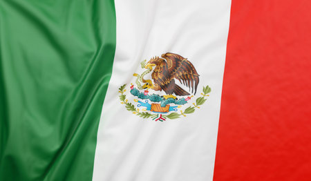Mexico flag blowing in the wind. Mexican flag full page