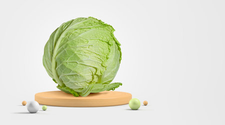 Green cabbage isolated from background on wooden base with copy space