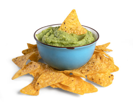 bowl with guacamole and nachos isolated on the white backgroundの写真素材