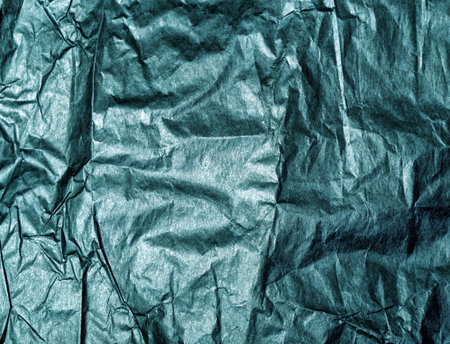 Big crumpled paper background for art design. green texture.の写真素材