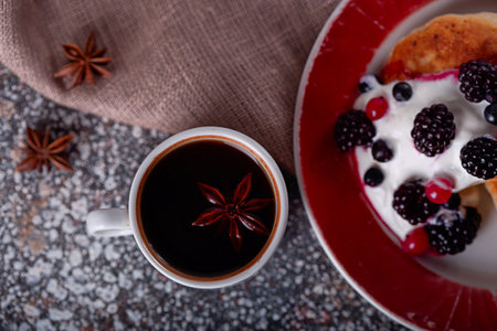 coffee with pancakes and fresh berries top viewの写真素材