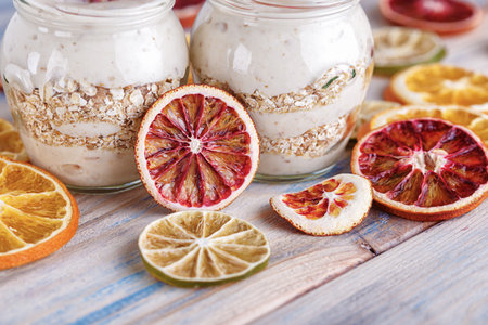Healthy yogurt with orange, selective focus