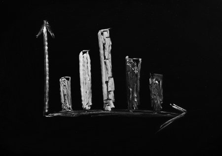 graph is drawn in chalk on a blackboard.の写真素材