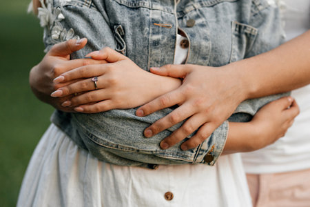 hands of a young couple close upの写真素材