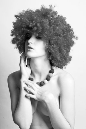 creative portrait of a beauty young woman in the wig (white black)の写真素材
