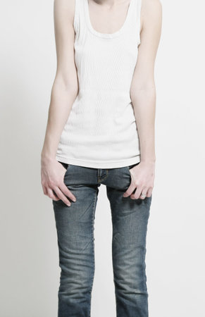 shape of thin woman in shirt and jeansの写真素材