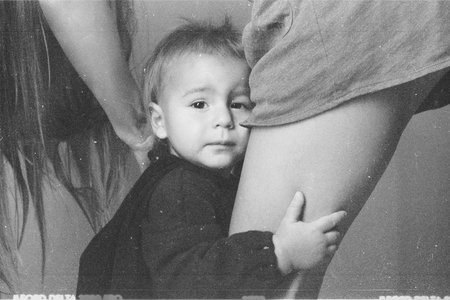 beauty sad little boy with motherの写真素材