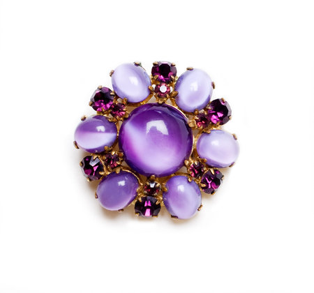 retro brooche with lilac gems isolated on a whiteの写真素材