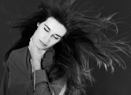 desaturated portrait of beauty woman with luxury hairsの写真素材