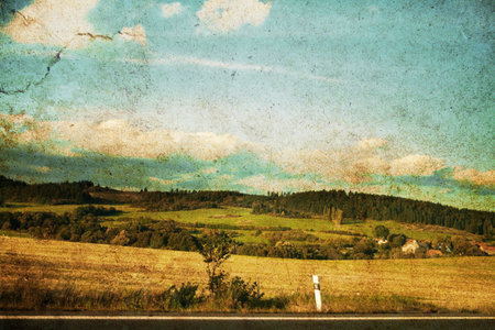 old-fashioned artistic landscape with blue skyの写真素材