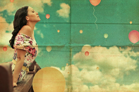 beauty young woman on sky, air balls, vintage collageの写真素材