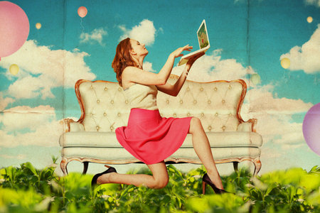 beautiful woman with laptop in clouds, vintage patternの写真素材